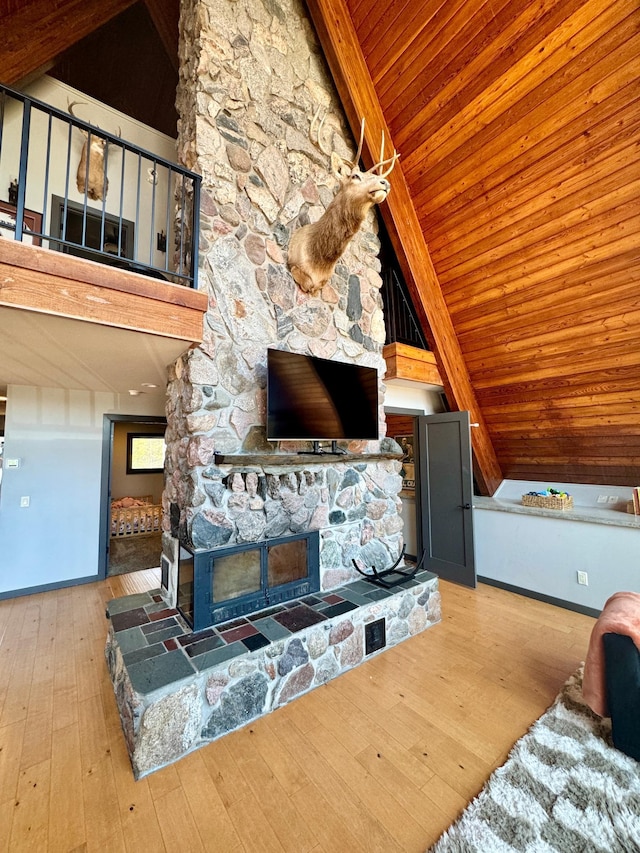 63521 County Road 2, Warroad, MN 56763 - living room featuring wooden ceiling, lofted ceiling, and hardwood / wood-style floors
