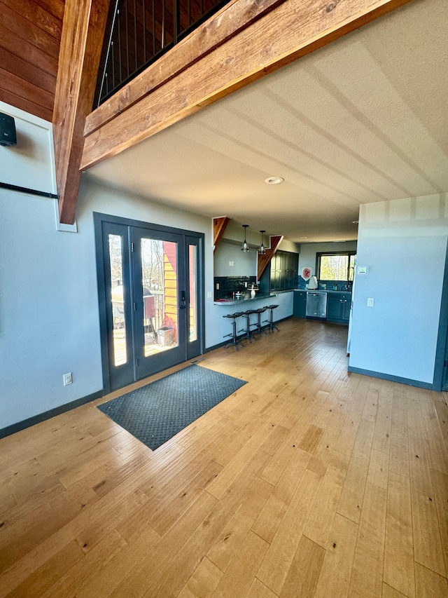 63521 County Road 2, Warroad, MN 56763 - entrance foyer with baseboards and wood finished floors