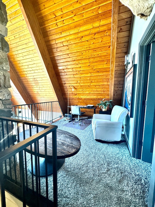 63521 County Road 2, Warroad, MN 56763 - living area with beamed ceiling, wood ceiling, and carpet