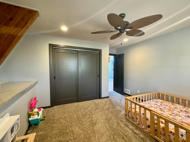 63521 County Road 2, Warroad, MN 56763 - bedroom with carpet flooring, recessed lighting, a ceiling fan, visible vents, and a closet