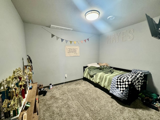 63521 County Road 2, Warroad, MN 56763 - carpeted bedroom featuring baseboards and visible vents