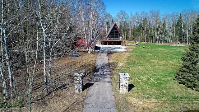 63521 County Road 2, Warroad, MN 56763 - exterior space featuring a front yard and a forest view