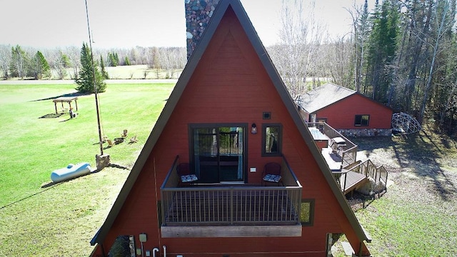 63521 County Road 2, Warroad, MN 56763 - back of property with a yard and a forest view