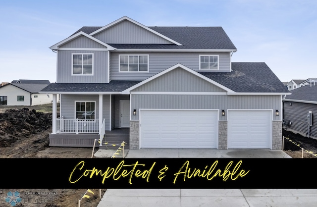 5875 11th St W, West Fargo, ND 58078 - craftsman-style home with a shingled roof, covered porch, and stone siding