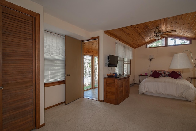 bedroom with lofted ceiling, wooden ceiling, light colored carpet, baseboards, and ceiling fan