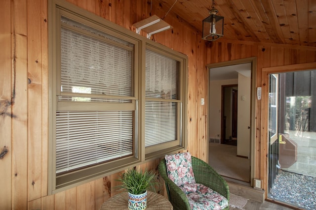 sunroom / solarium with lofted ceiling