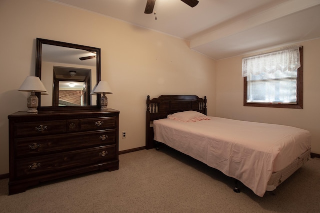 bedroom featuring light colored carpet, baseboards, and ceiling fan