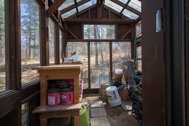 sunroom / solarium with vaulted ceiling