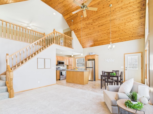 living area with wooden ceiling, ceiling fan with notable chandelier, high vaulted ceiling, and stairway