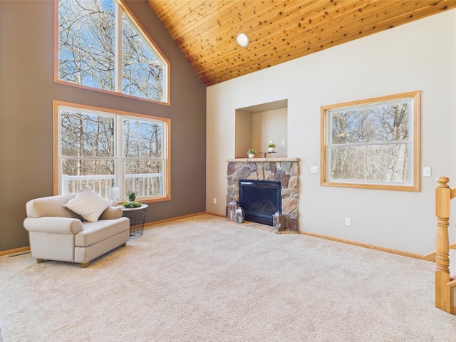 living area with high vaulted ceiling, baseboards, a fireplace, and carpet floors