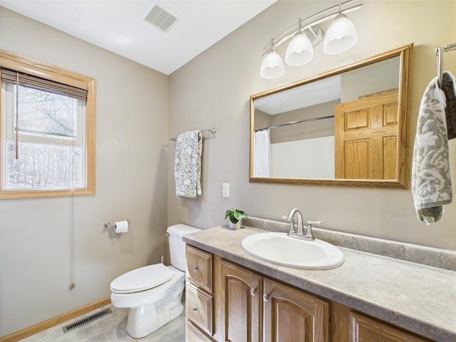 full bath with toilet, baseboards, visible vents, and vanity