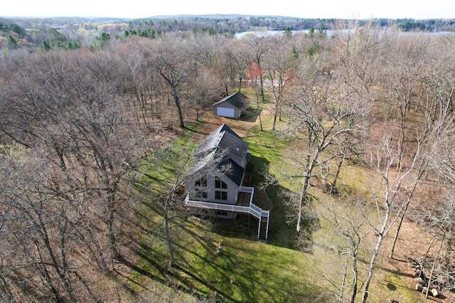 drone / aerial view with a view of trees