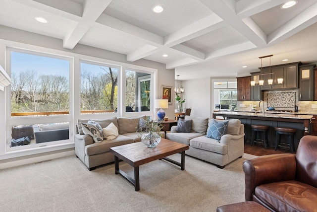 living room featuring recessed lighting, coffered ceiling, and beam ceiling