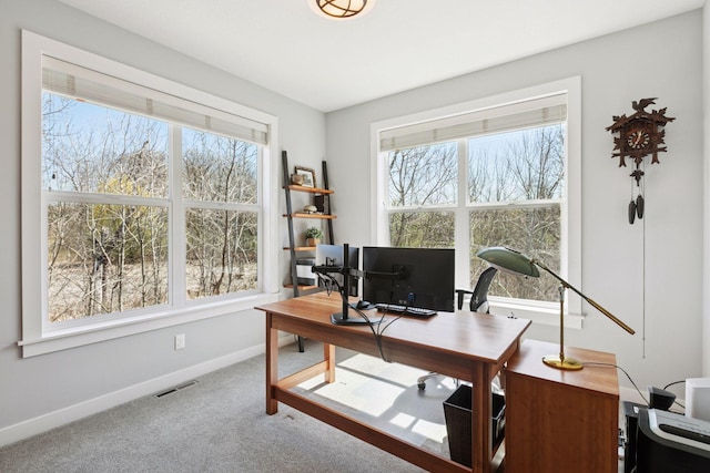office with visible vents, carpet flooring, and baseboards