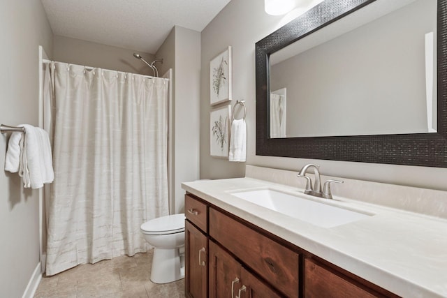 full bath featuring vanity, tile patterned floors, toilet, and curtained shower