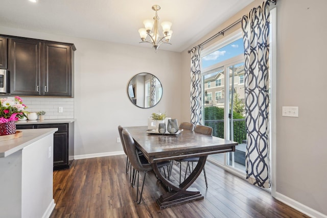 11462 81st Pl N, Maple Grove, MN 55369 - dining space featuring baseboards, a chandelier, and dark wood-style flooring