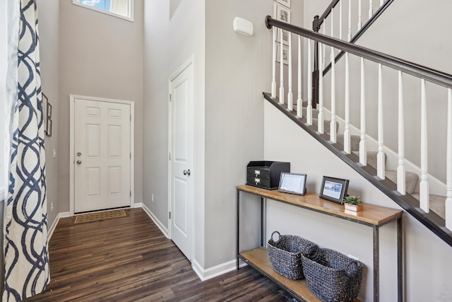 11462 81st Pl N, Maple Grove, MN 55369 - foyer featuring dark wood-style flooring, baseboards, stairway, and a towering ceiling
