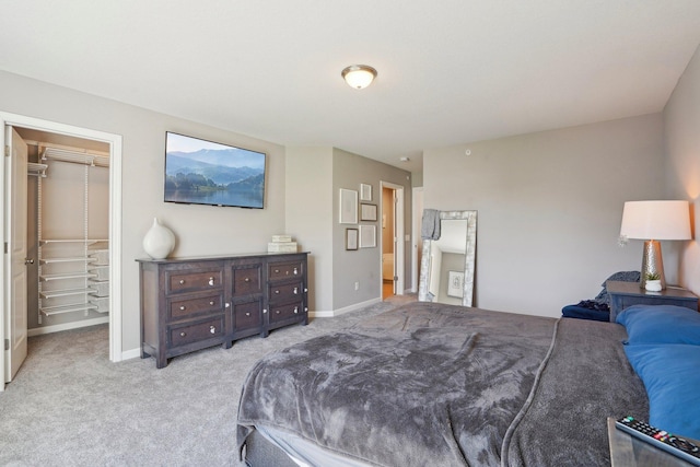 11462 81st Pl N, Maple Grove, MN 55369 - carpeted bedroom featuring a walk in closet, a closet, and baseboards