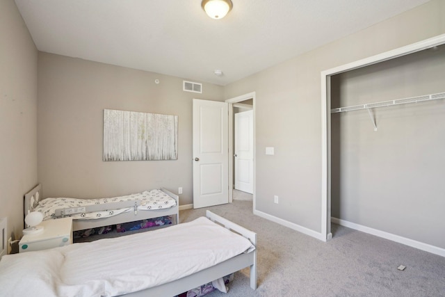11462 81st Pl N, Maple Grove, MN 55369 - bedroom featuring carpet floors, a closet, and baseboards