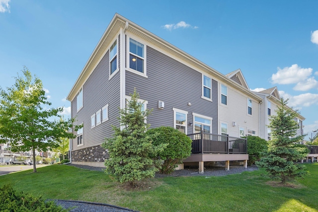 11462 81st Pl N, Maple Grove, MN 55369 - back of house featuring a lawn and a deck