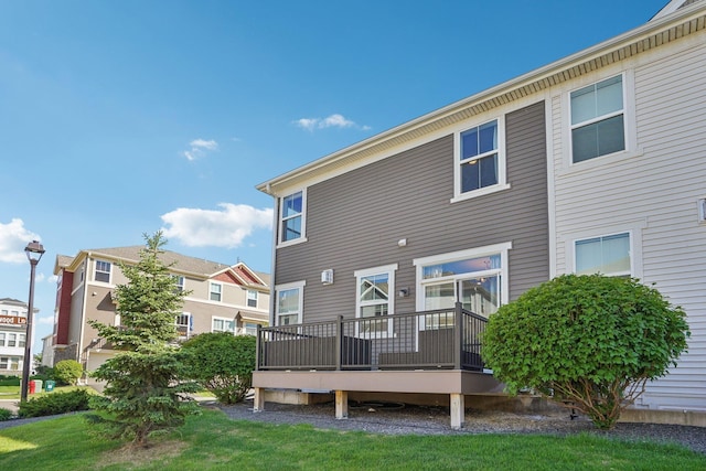 11462 81st Pl N, Maple Grove, MN 55369 - rear view of house with a deck and a yard