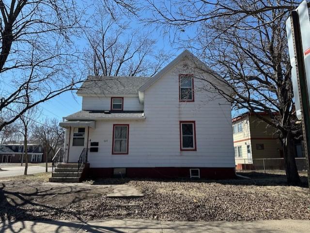 627 7th Ave S, Saint Cloud, MN 56301 - view of front of house with roof with shingles