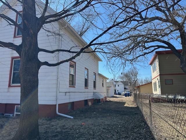 627 7th Ave S, Saint Cloud, MN 56301 - view of property exterior featuring fence