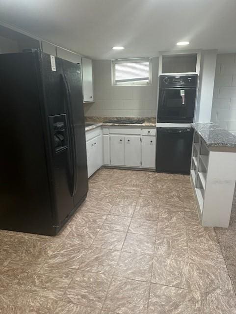 627 7th Ave S, Saint Cloud, MN 56301 - kitchen with black appliances, open shelves, white cabinetry, and light stone countertops