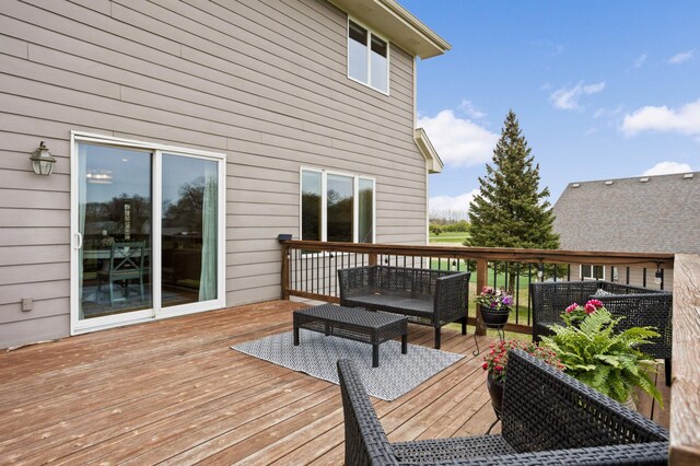 wooden deck featuring outdoor lounge area