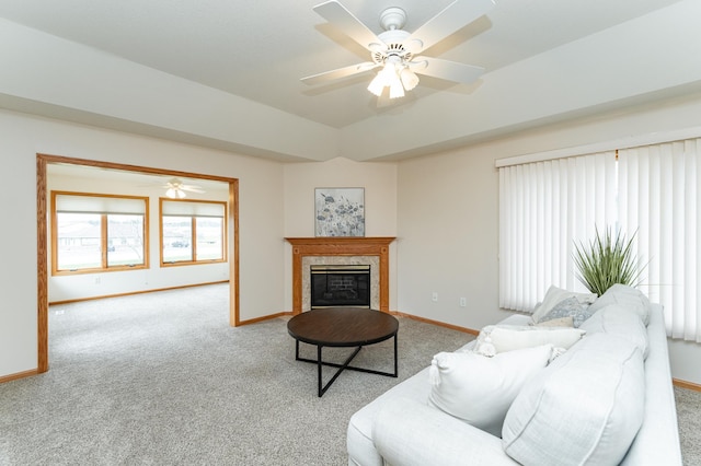 274 Dawn Ave, Saint Charles, MN 55972 - carpeted living room featuring baseboards, a ceiling fan, and a fireplace