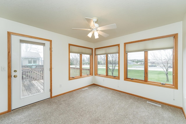 274 Dawn Ave, Saint Charles, MN 55972 - empty room with baseboards, ceiling fan, and carpet