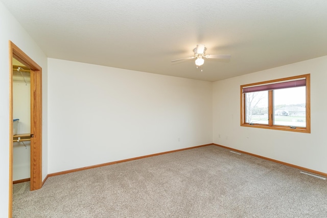 274 Dawn Ave, Saint Charles, MN 55972 - carpeted empty room featuring baseboards, a ceiling fan, and visible vents