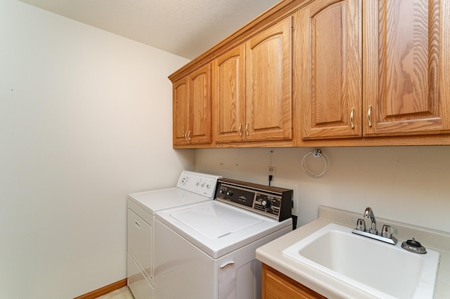 274 Dawn Ave, Saint Charles, MN 55972 - laundry area with a sink, separate washer and dryer, and cabinet space