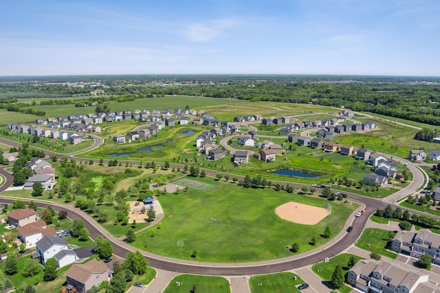 bird's eye view with a water view and a residential view