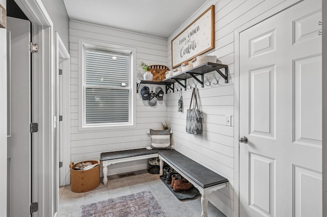 11270 Meadow View Ln, Maple Grove, MN 55311 - mudroom featuring wood walls and light tile patterned flooring