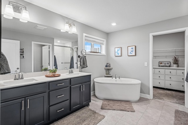 11270 Meadow View Ln, Maple Grove, MN 55311 - bathroom with a sink, a shower stall, double vanity, and a freestanding bath