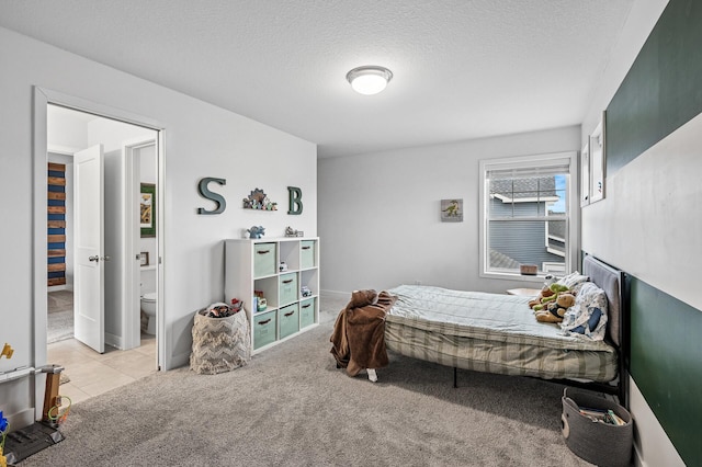 11270 Meadow View Ln, Maple Grove, MN 55311 - bedroom with light tile patterned floors, a textured ceiling, and light colored carpet