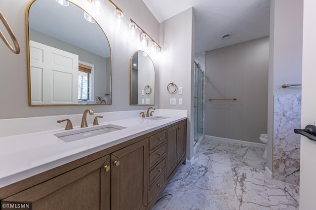 509 Superior Ave, Crosby, MN 56441 - full bathroom featuring a sink, walk in shower, toilet, and marble finish floor