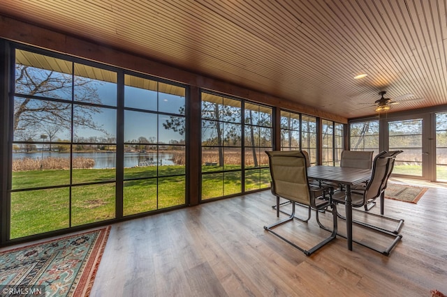 509 Superior Ave, Crosby, MN 56441 - sunroom with a ceiling fan, outdoor dining area, a water view, and wood finished floors