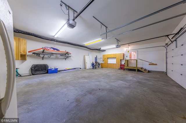 509 Superior Ave, Crosby, MN 56441 - garage featuring a garage door opener