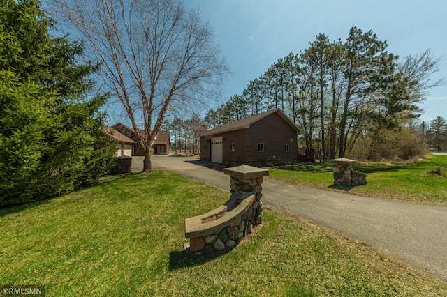 509 Superior Ave, Crosby, MN 56441 - view of side of property with a lawn and driveway