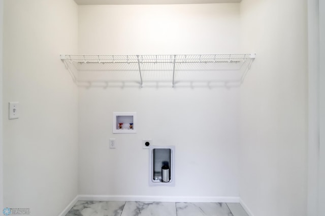 laundry room featuring washer hookup, laundry area, marble finish floor, baseboards, and hookup for an electric dryer