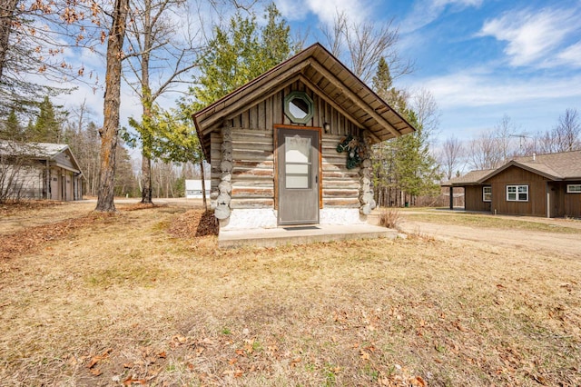 exterior space with log siding