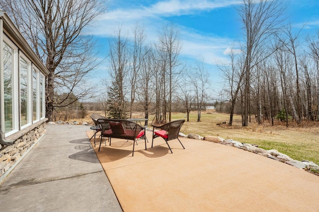 view of patio featuring outdoor dining space