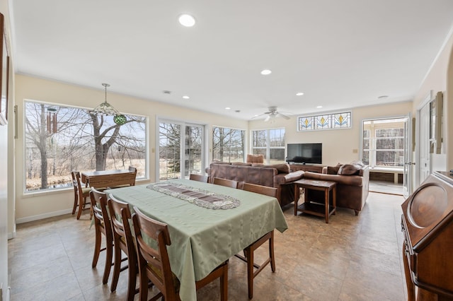 dining area with plenty of natural light, recessed lighting, baseboards, and a ceiling fan
