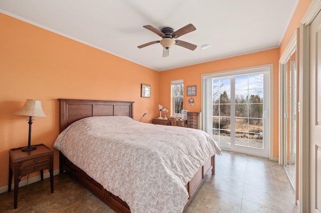 bedroom featuring access to outside, baseboards, and crown molding