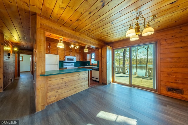 27042 Round Lake Rd, Bay Lake Twp, MN 56444 - kitchen with visible vents, dark countertops, wooden ceiling, dark wood-style floors, and white appliances