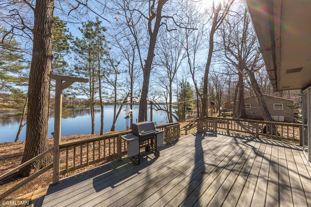 27042 Round Lake Rd, Bay Lake Twp, MN 56444 - deck with a water view and a grill