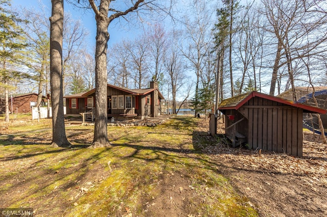 27042 Round Lake Rd, Bay Lake Twp, MN 56444 - view of yard with an outdoor structure