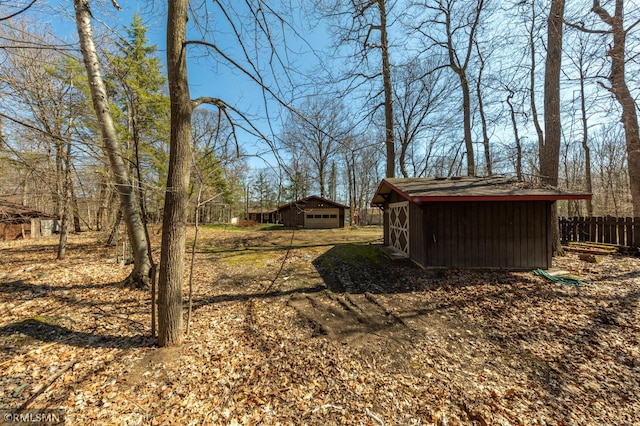 27042 Round Lake Rd, Bay Lake Twp, MN 56444 - view of yard with fence and an outdoor structure